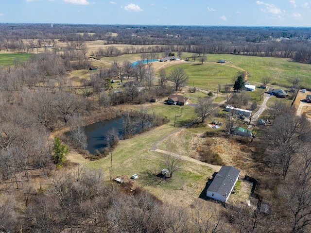 birds eye view of property featuring a rural view