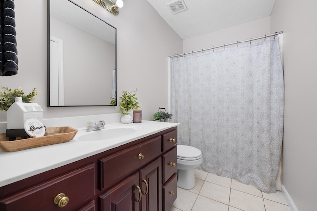 full bath featuring visible vents, toilet, a textured ceiling, tile patterned flooring, and vanity