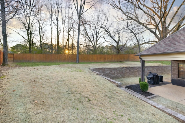 view of yard with a patio and fence