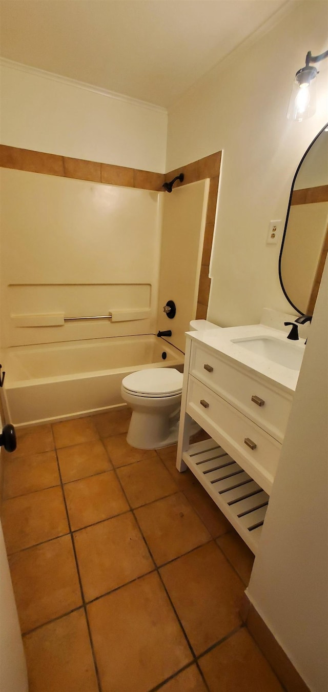 full bath featuring tile patterned floors, toilet, shower / tub combination, crown molding, and vanity