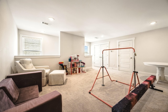 rec room with recessed lighting, baseboards, visible vents, and carpet floors