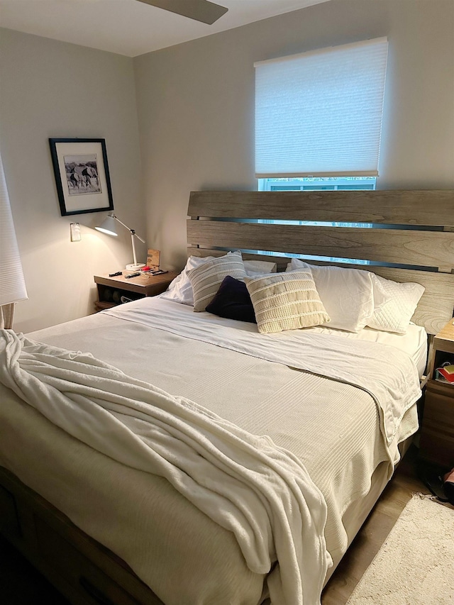 bedroom with wood finished floors