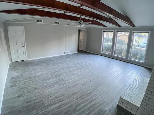 unfurnished living room featuring visible vents, baseboards, and wood finished floors