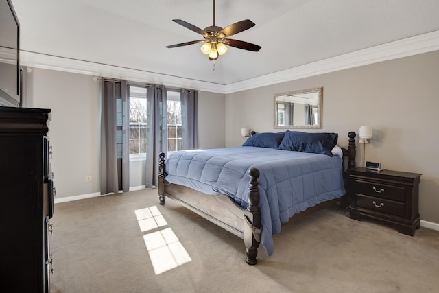 bedroom featuring ceiling fan, baseboards, light colored carpet, and ornamental molding