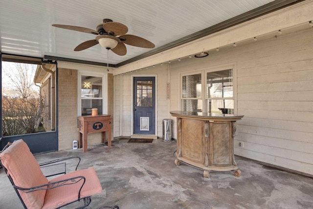 view of patio / terrace featuring a ceiling fan