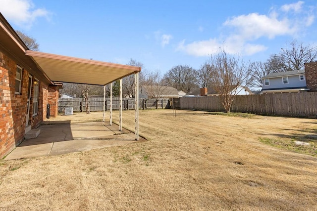 view of yard featuring a fenced backyard and a patio area