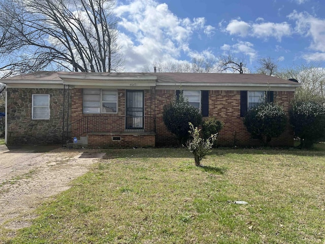 ranch-style house with brick siding and a front yard