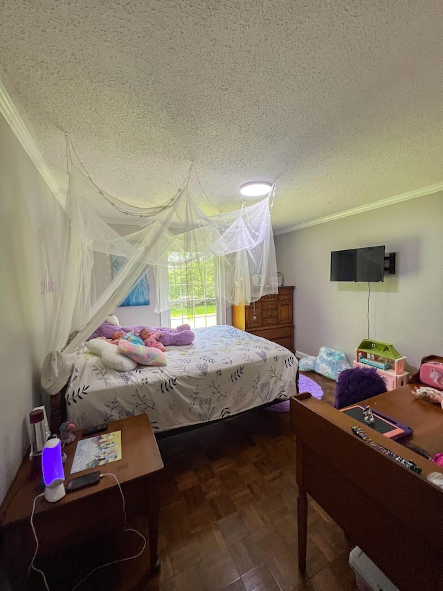 bedroom with a textured ceiling and crown molding