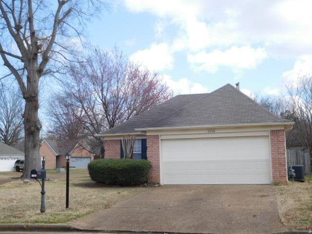 ranch-style home featuring a garage, central air condition unit, brick siding, and driveway