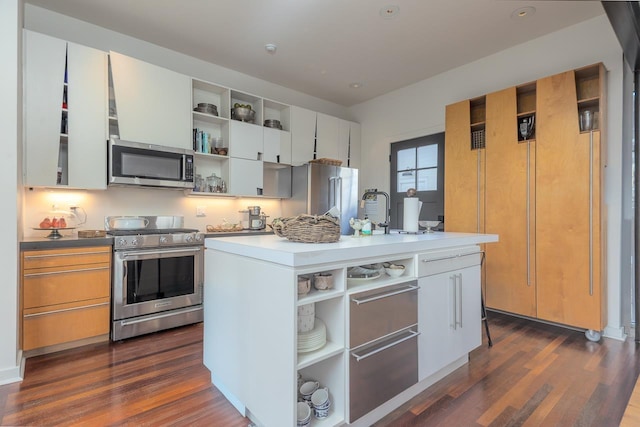 kitchen with open shelves, dark wood-style flooring, and appliances with stainless steel finishes