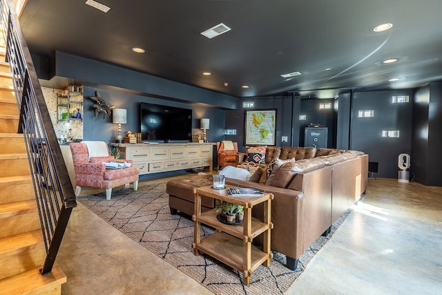 home theater room with visible vents, recessed lighting, and finished concrete flooring