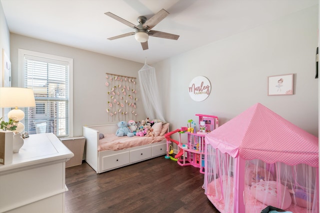 bedroom featuring a ceiling fan and wood finished floors