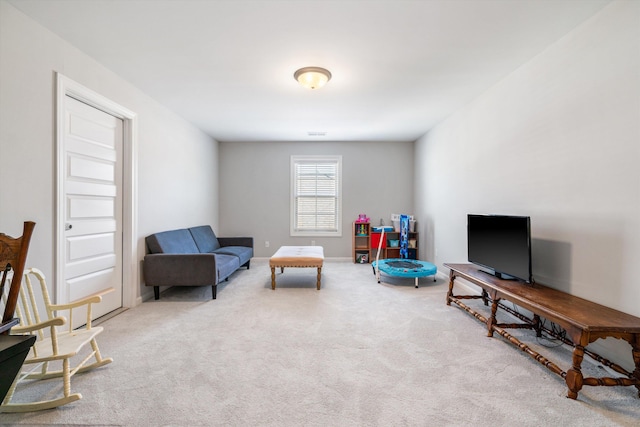 living area with carpet