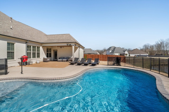 view of pool with a fenced in pool, a patio, and a fenced backyard