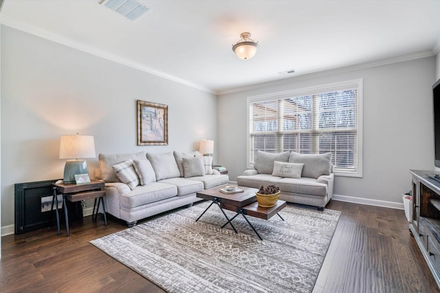 living area with dark wood-type flooring, baseboards, and visible vents