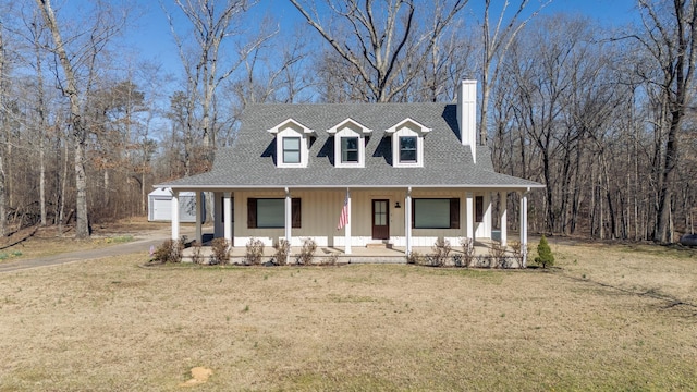 view of front of property featuring a porch, a front lawn, roof with shingles, and a chimney