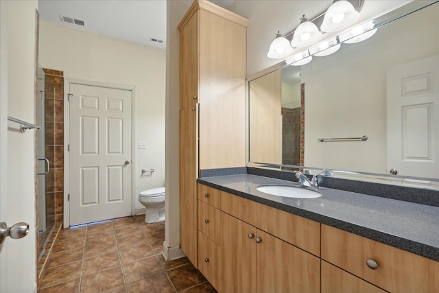 full bath featuring tile patterned flooring, a shower stall, toilet, and visible vents