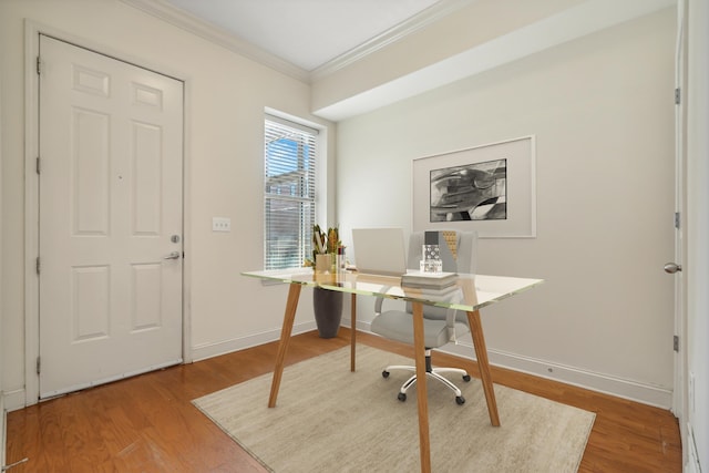 office featuring crown molding, baseboards, and wood finished floors