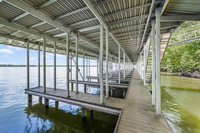 dock area featuring a water view