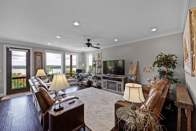 living area featuring a ceiling fan, crown molding, recessed lighting, and wood finished floors