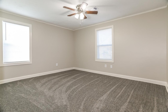 unfurnished room with a wealth of natural light, baseboards, and ornamental molding