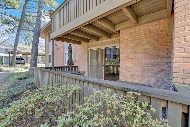 exterior space with a carport