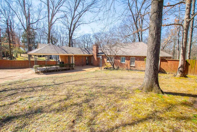 view of yard featuring fence