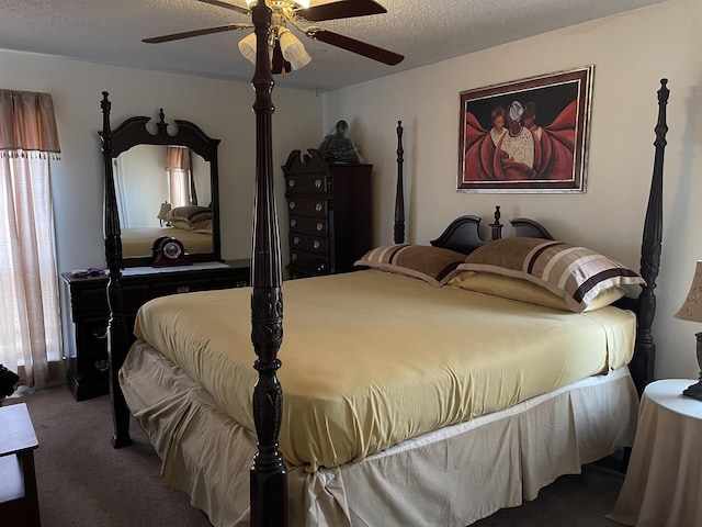 bedroom featuring a textured ceiling, ceiling fan, and carpet flooring