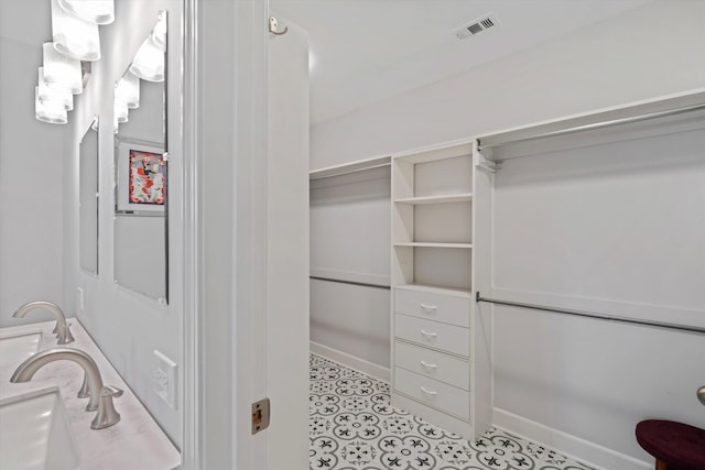 bathroom with visible vents and tile patterned flooring