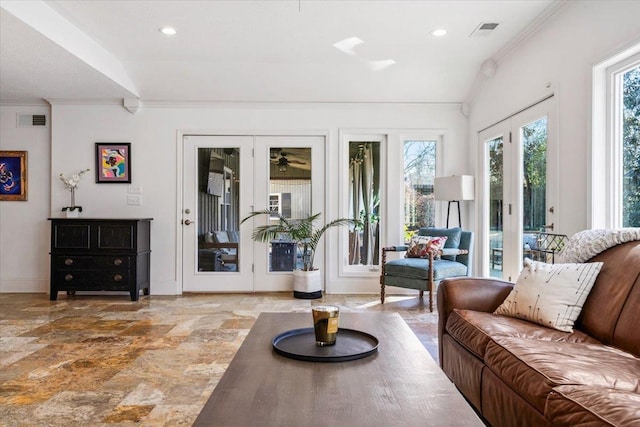 living room with visible vents, recessed lighting, crown molding, and baseboards