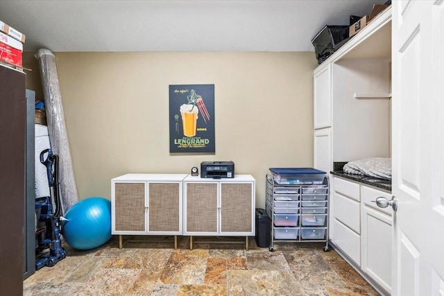 misc room with stone finish flooring