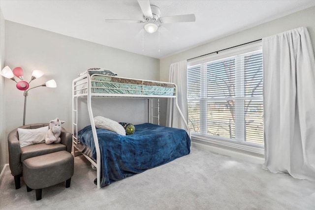 bedroom featuring carpet and a ceiling fan