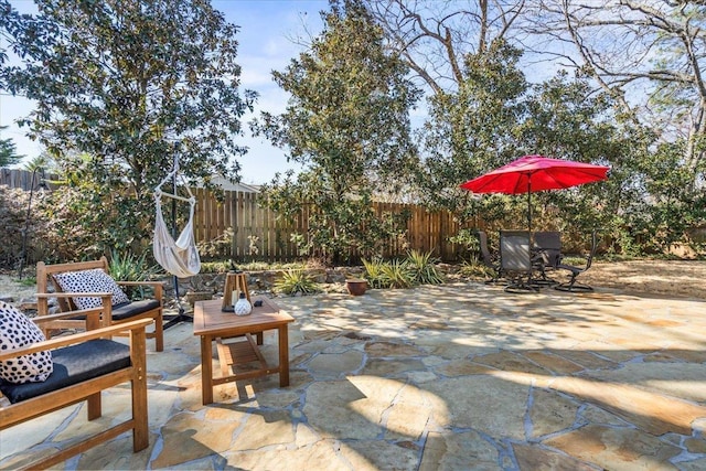 view of patio with fence