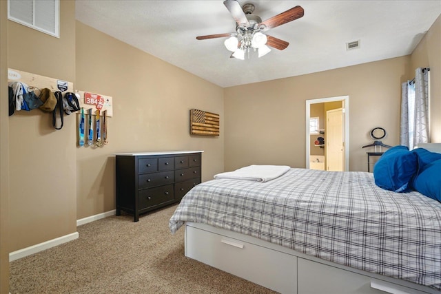 bedroom featuring visible vents, baseboards, light colored carpet, and a ceiling fan