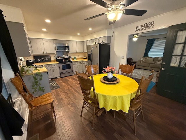 dining area with recessed lighting, visible vents, dark wood-type flooring, and ceiling fan