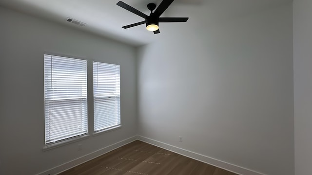 unfurnished room with baseboards, a healthy amount of sunlight, visible vents, and ceiling fan