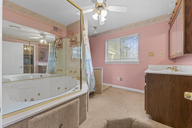 bathroom with vanity, a ceiling fan, baseboards, visible vents, and a textured ceiling