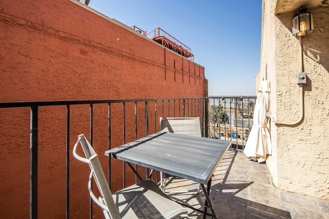 balcony with outdoor dining area