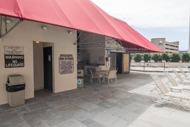 view of patio / terrace featuring outdoor dining space and area for grilling