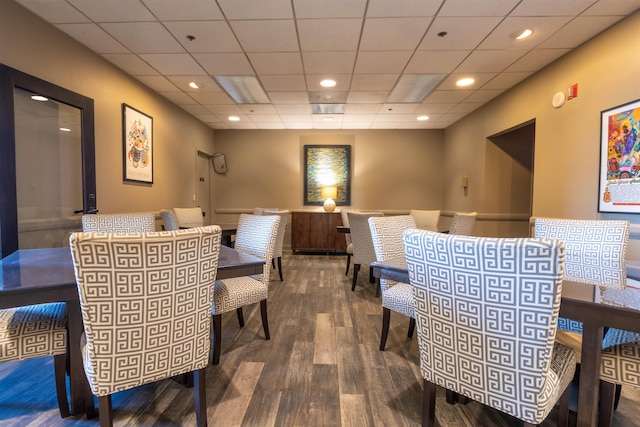 dining space with recessed lighting and wood finished floors