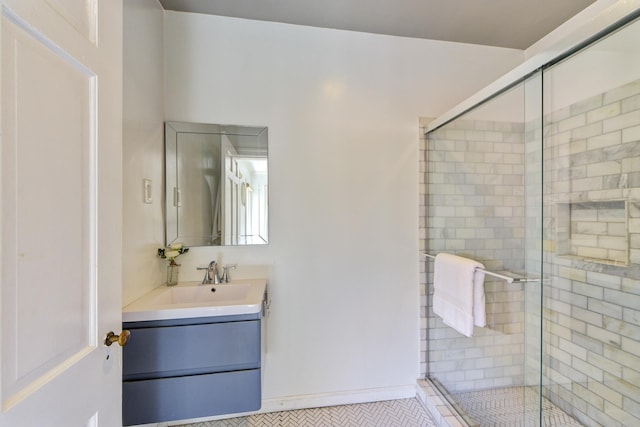 full bathroom featuring vanity, a shower stall, and tile patterned flooring