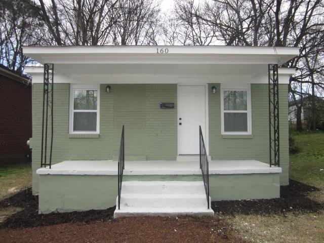 exterior space featuring covered porch