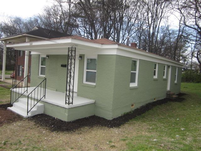 exterior space featuring crawl space, covered porch, and a front yard