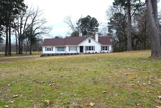 ranch-style house with a front yard