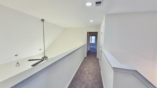 corridor featuring visible vents, baseboards, recessed lighting, an upstairs landing, and dark carpet