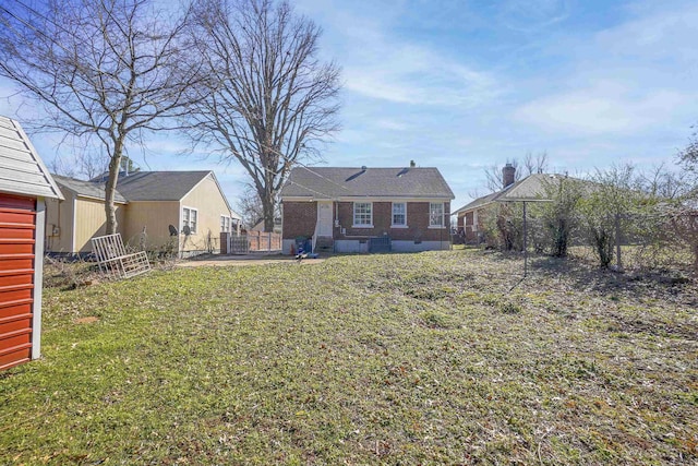 view of yard featuring a gate and fence