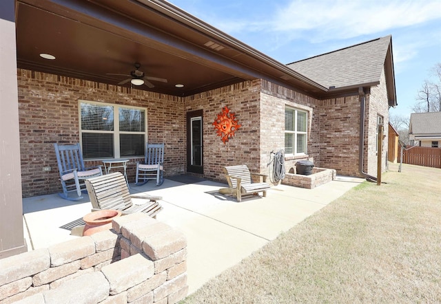 view of patio / terrace featuring a ceiling fan and fence