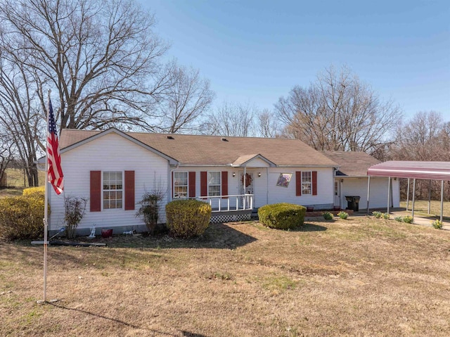 ranch-style home featuring a carport and a front yard