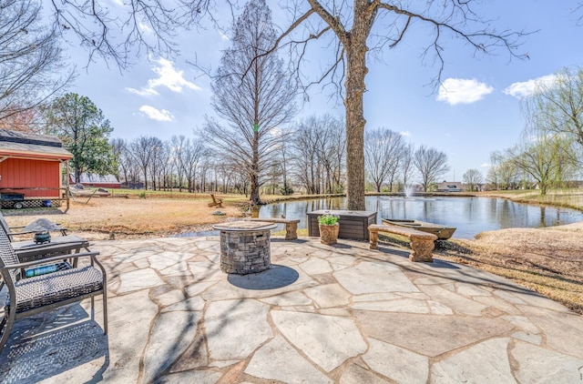 view of patio / terrace featuring a water view