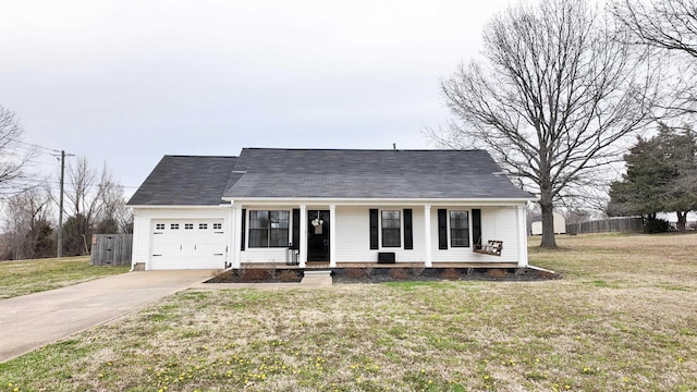 view of front of house featuring driveway, a porch, fence, a front yard, and an attached garage